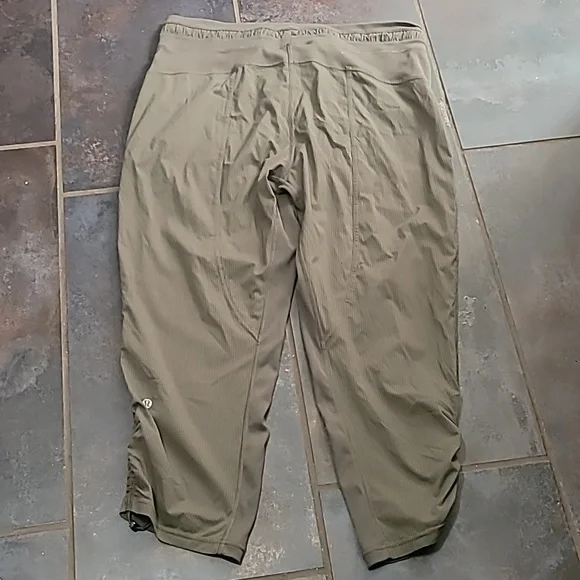 LULULEMON DANCE STUDIO CROP 25” DARK OLIVE SIZE 12 - Picture 8 of 8